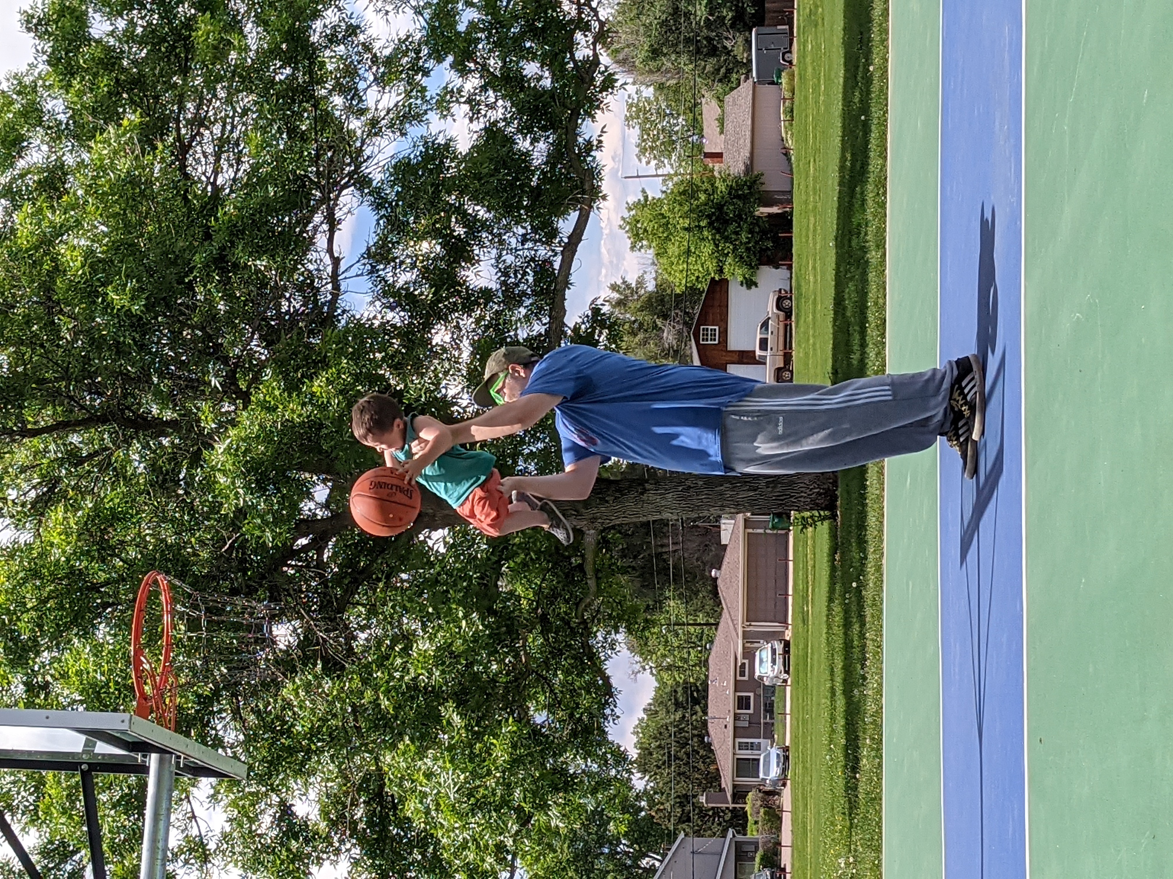 Flanny and myself playing basketball together.